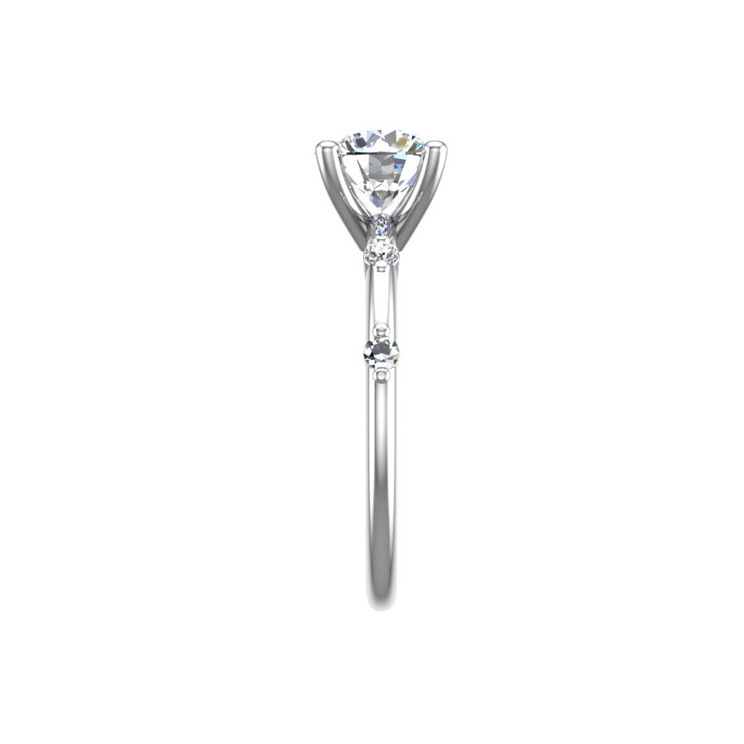 Quillara Solitaire Engagement Ring in white gold with a round center stone, side view