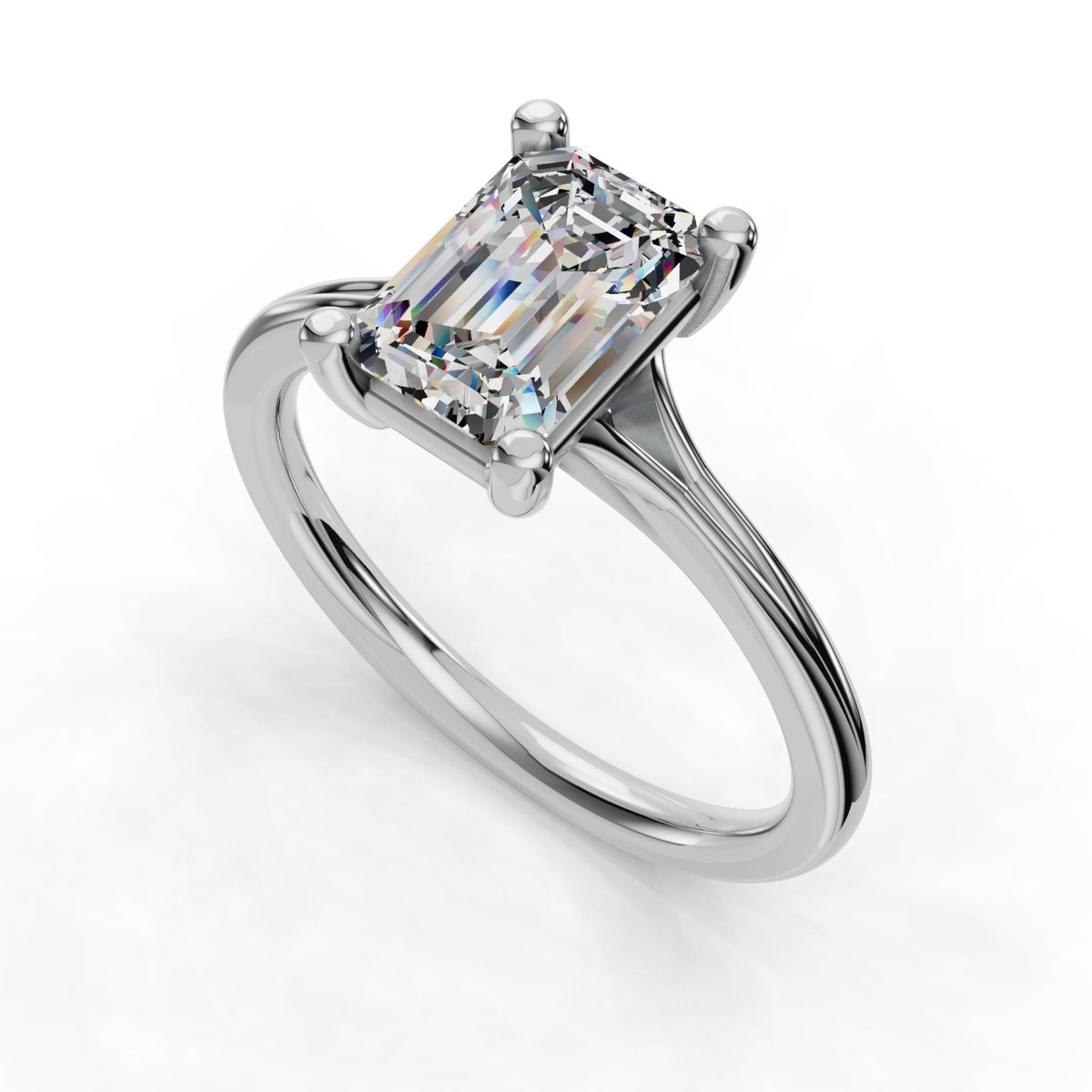 Xerine Split Shank Engagement Ring in white gold with an emerald center stone, 3D view